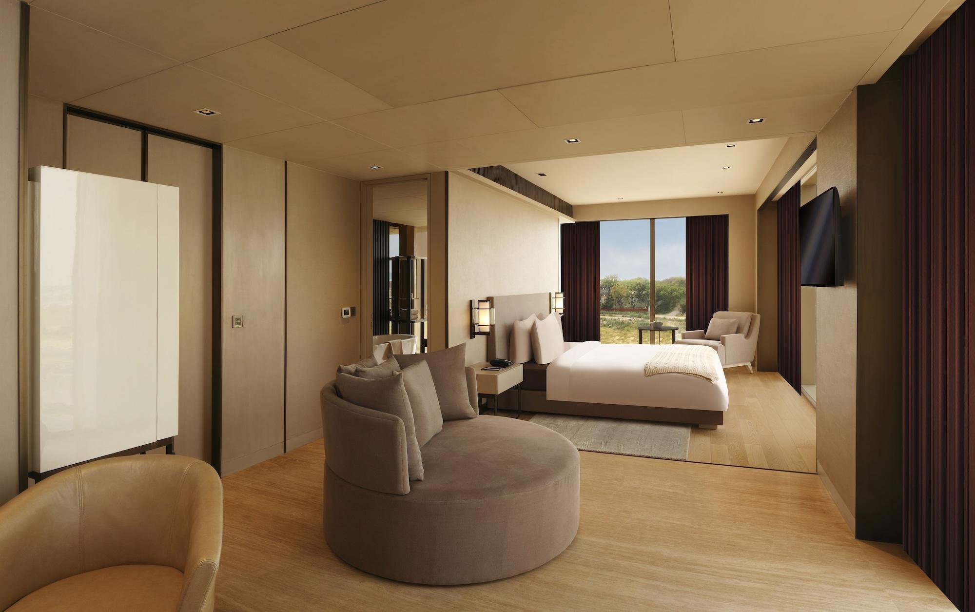 Roseate House New Delhi Nova Deli Exterior foto A bedroom at the hotel