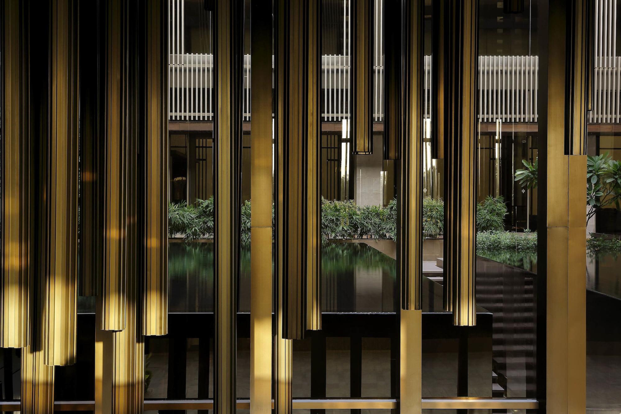 Roseate House New Delhi Nova Deli Exterior foto The hotel's lobby